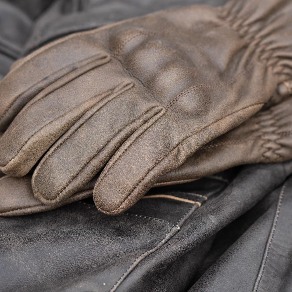 'ol Bobber' | Classic Leather Motorbike Jacket in Distressed Charcoal Brown with brown "the Original: Gloves on top. 